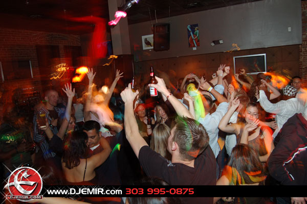 Nightclub Party Crowd throwing hands Up in Denver